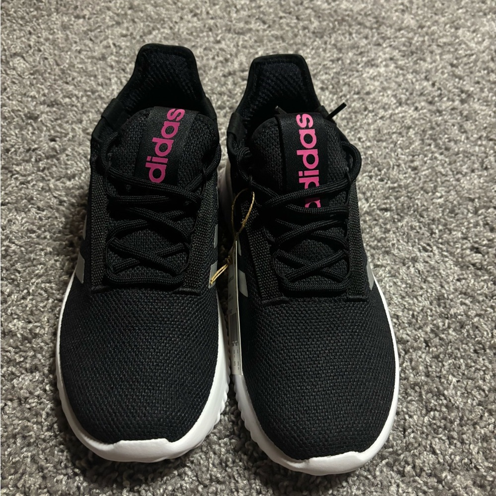 Brand new in the box men’s size 7 adidas sneakers.